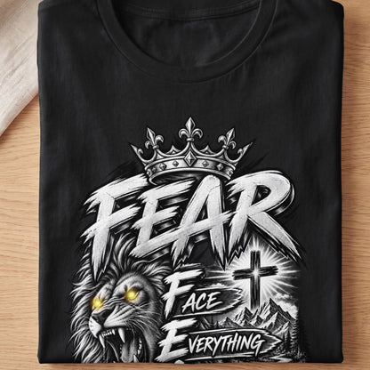 Black t-shirt graphic with lion, crown, and text "FEAR FACE EVERYTHING".