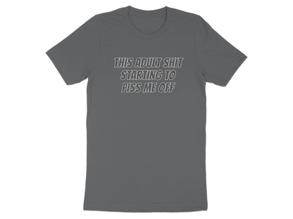 Grey t-shirt with white text reading "This adult shit starting to piss me off".