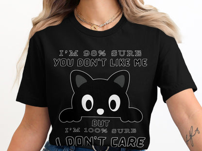 Black t-shirt with cartoon cat and text "I'm 98% sure you don't like me But I'm 100% sure I don't care".