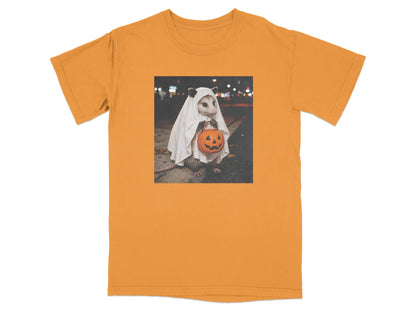 Opossum in ghost costume holding a jack-o-lantern candy bucket.