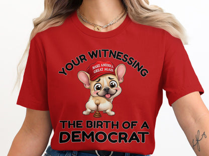 French bulldog wearing MAGA hat, with text "YOUR WITNESSING THE BIRTH OF A DEMOCRAT".