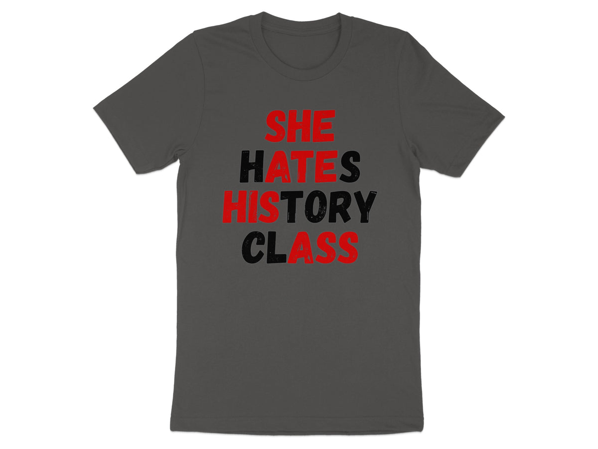 Dark grey t-shirt with red and black text reading "SHE HATES HISTORY CLASS."