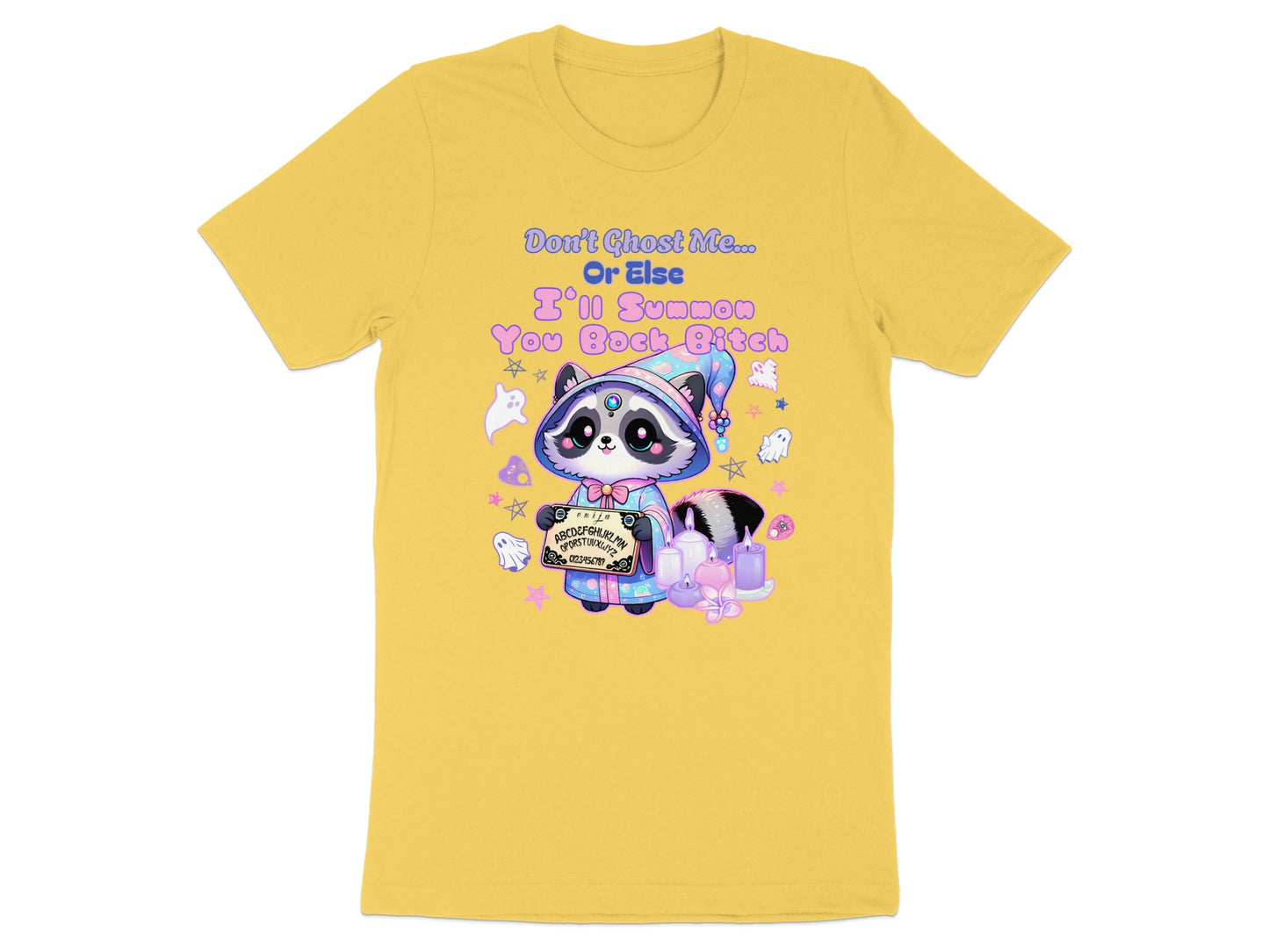 Yellow t-shirt with cartoon raccoon, Ouija board, and text "Don't Ghost Me... Or Else I'll Summon You Back Bitch."