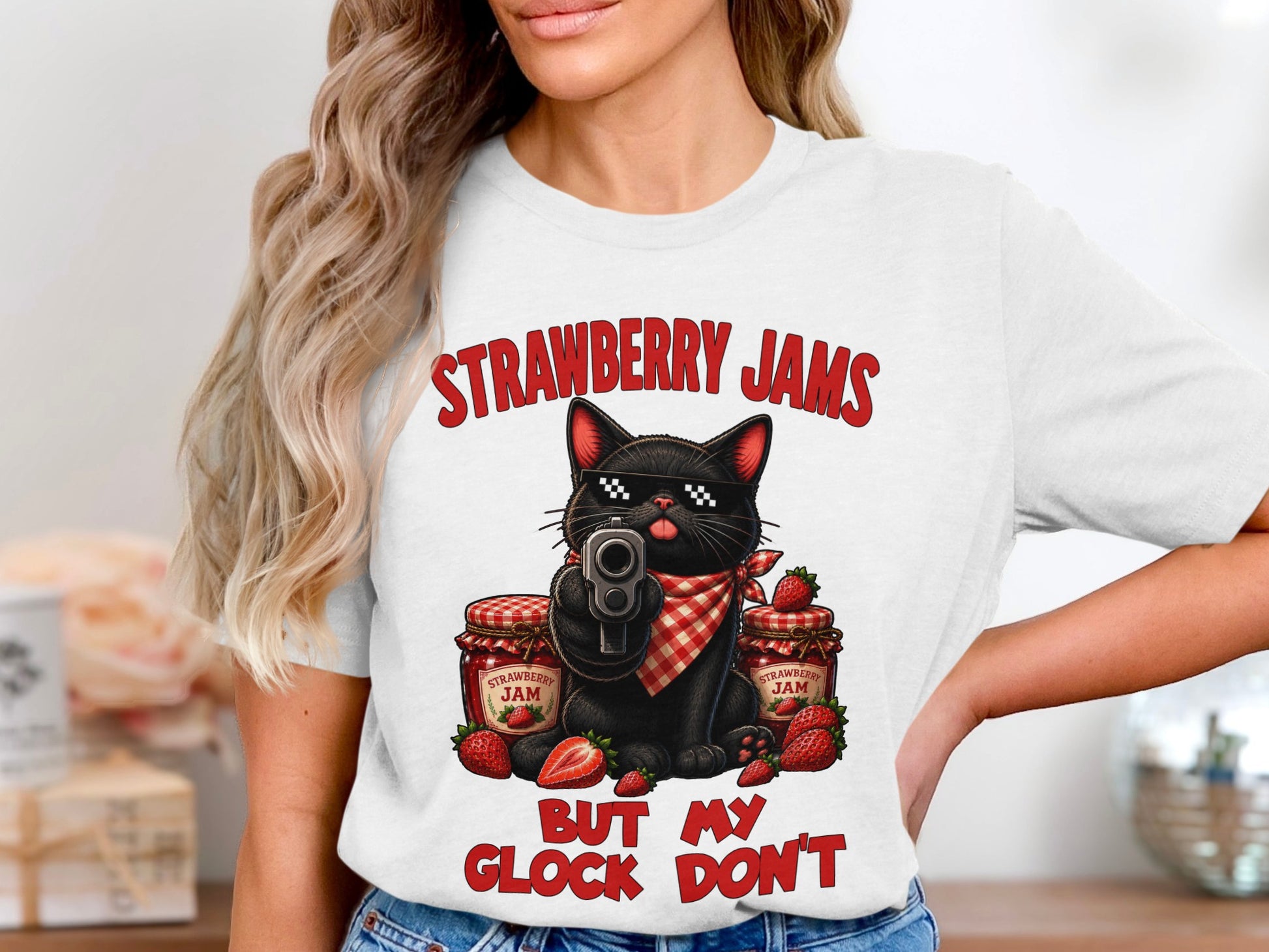 Black cat wearing sunglasses and bandana with gun and strawberry jam jars.