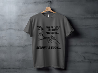 Grey t-shirt with line drawing of person reading and text "This is life's greatest pleasures... reading a book..."