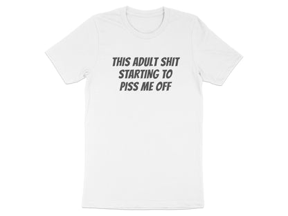 White t-shirt with gray text reading "THIS ADULT SHIT STARTING TO PISS ME OFF".