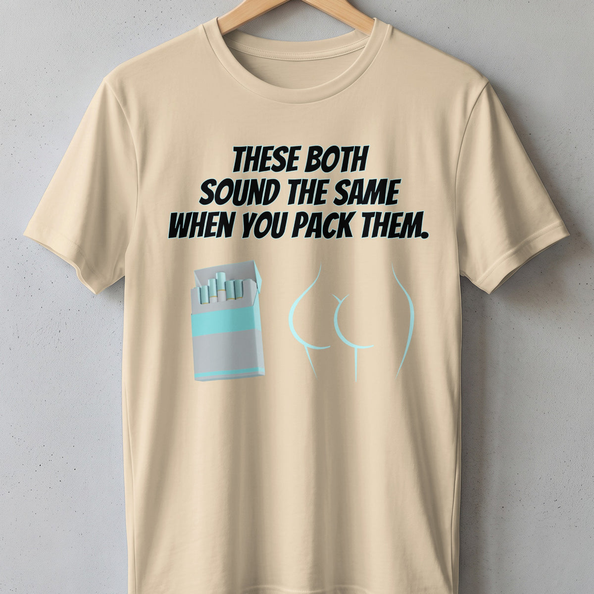 Beige t-shirt with text and graphics of cigarettes and buttocks.