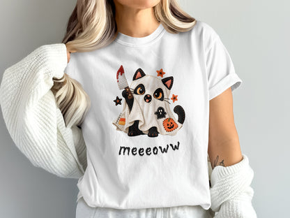 White t-shirt with a Halloween ghost cat graphic holding a bloody knife.