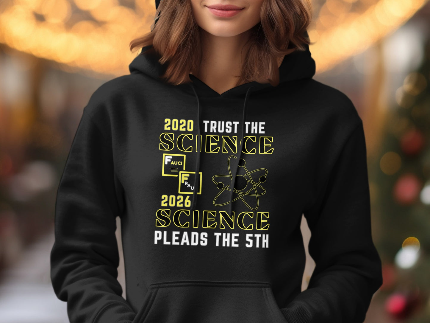 Black hoodie with text "2020 Trust The Science", "Fauci", atom symbol, "2026 Science Pleads the 5th".