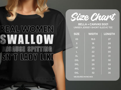 Black t-shirt with "Real Women Swallow" text and Bella + Canvas 3001 unisex size chart.